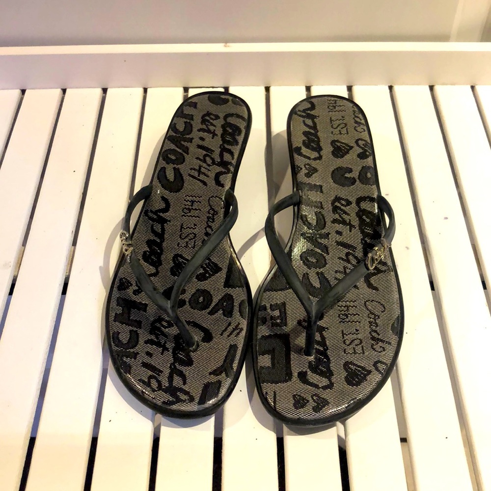 Coach black rubber flip flops. Size 8.
